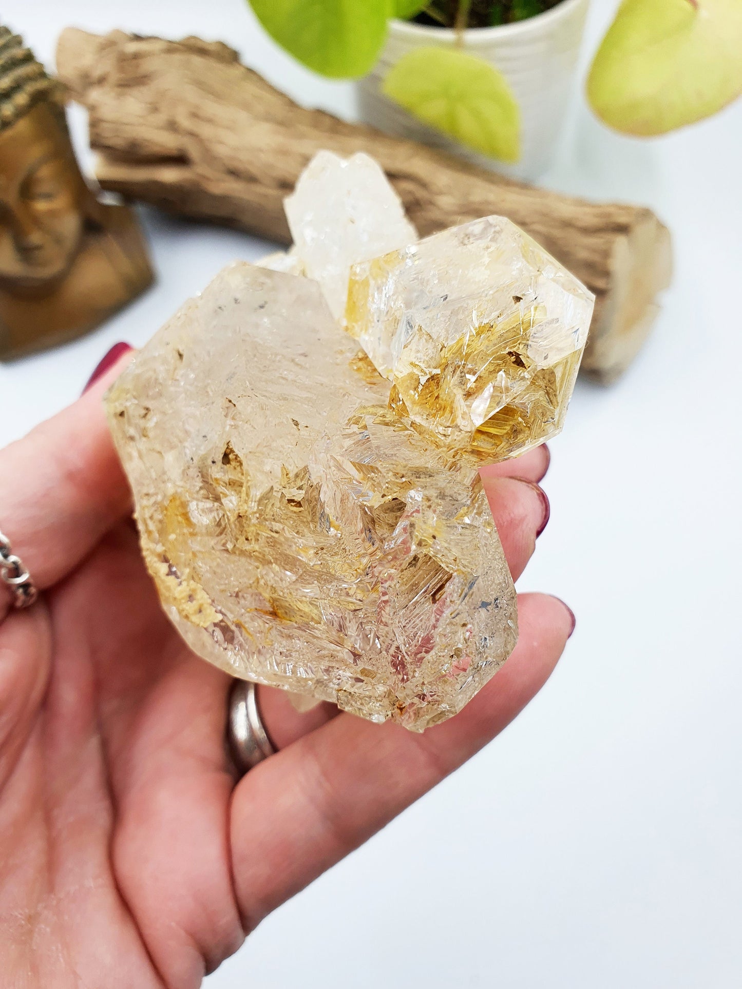 Skeletal Quartz Specimen from Pakistan with moving carbon bubble and rainbow flashes