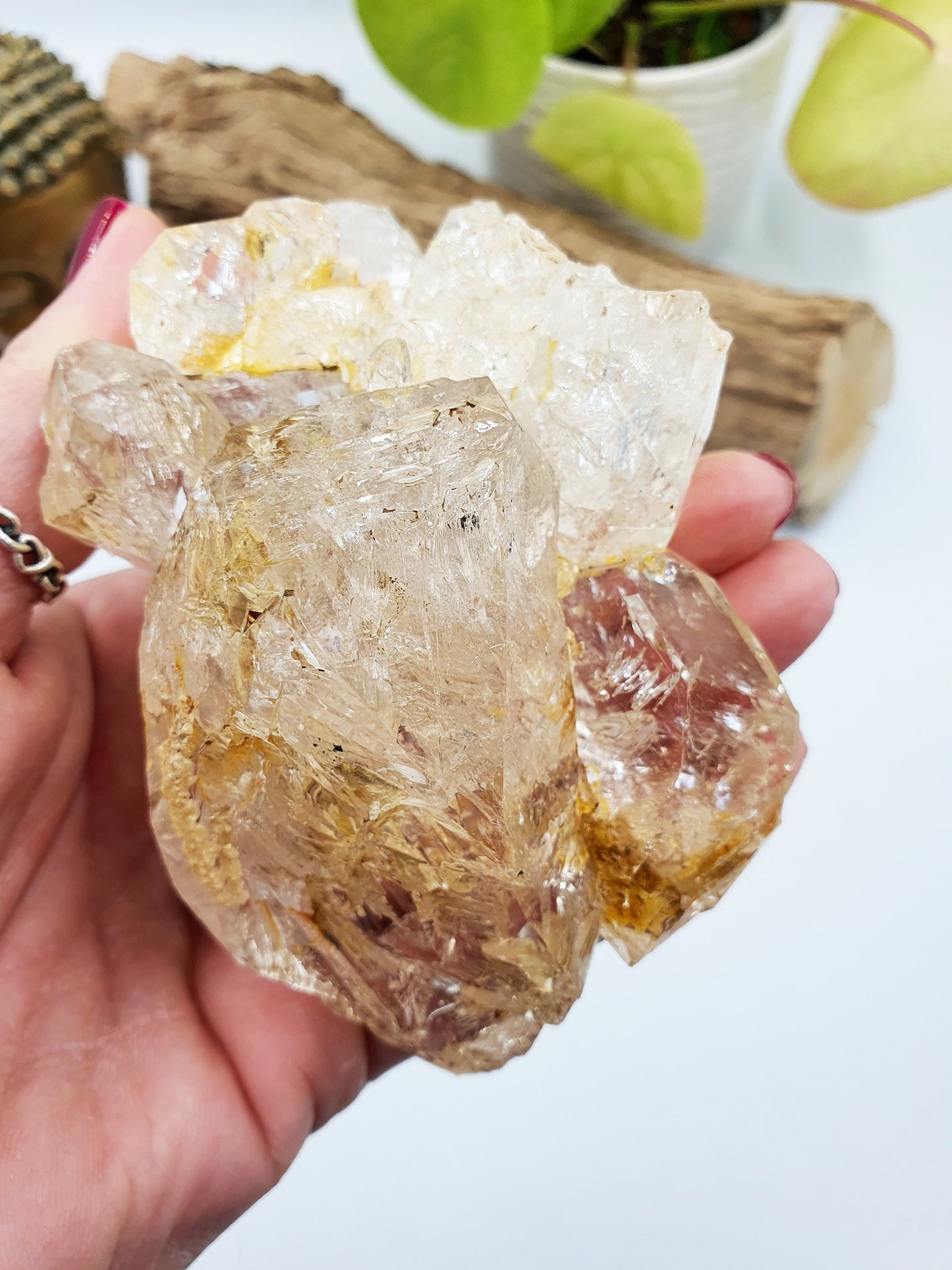 Skeletal Quartz Specimen from Pakistan with moving carbon bubble and rainbow flashes