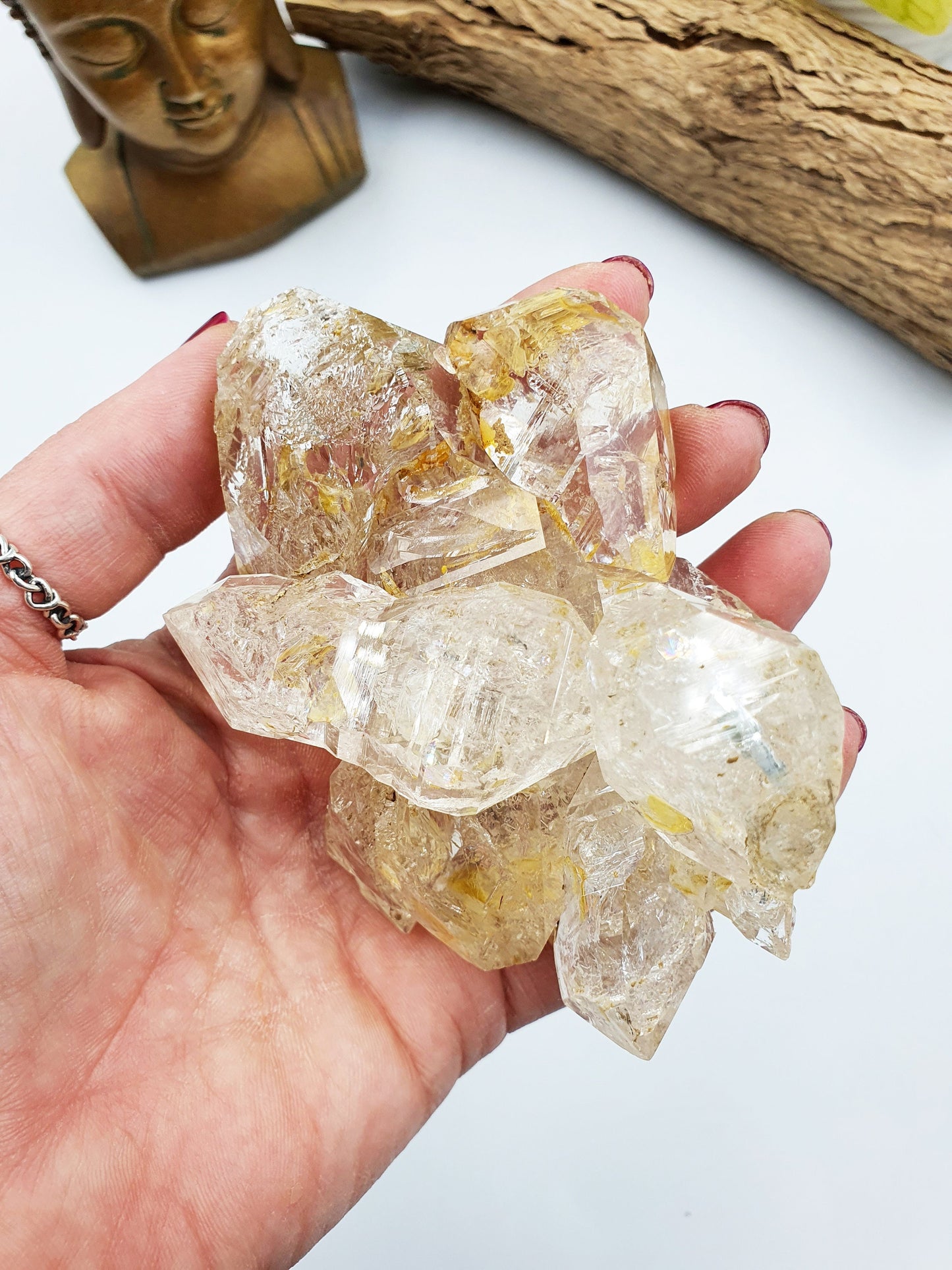 Skeletal Quartz Specimen from Pakistan with moving carbon bubble and rainbow flashes