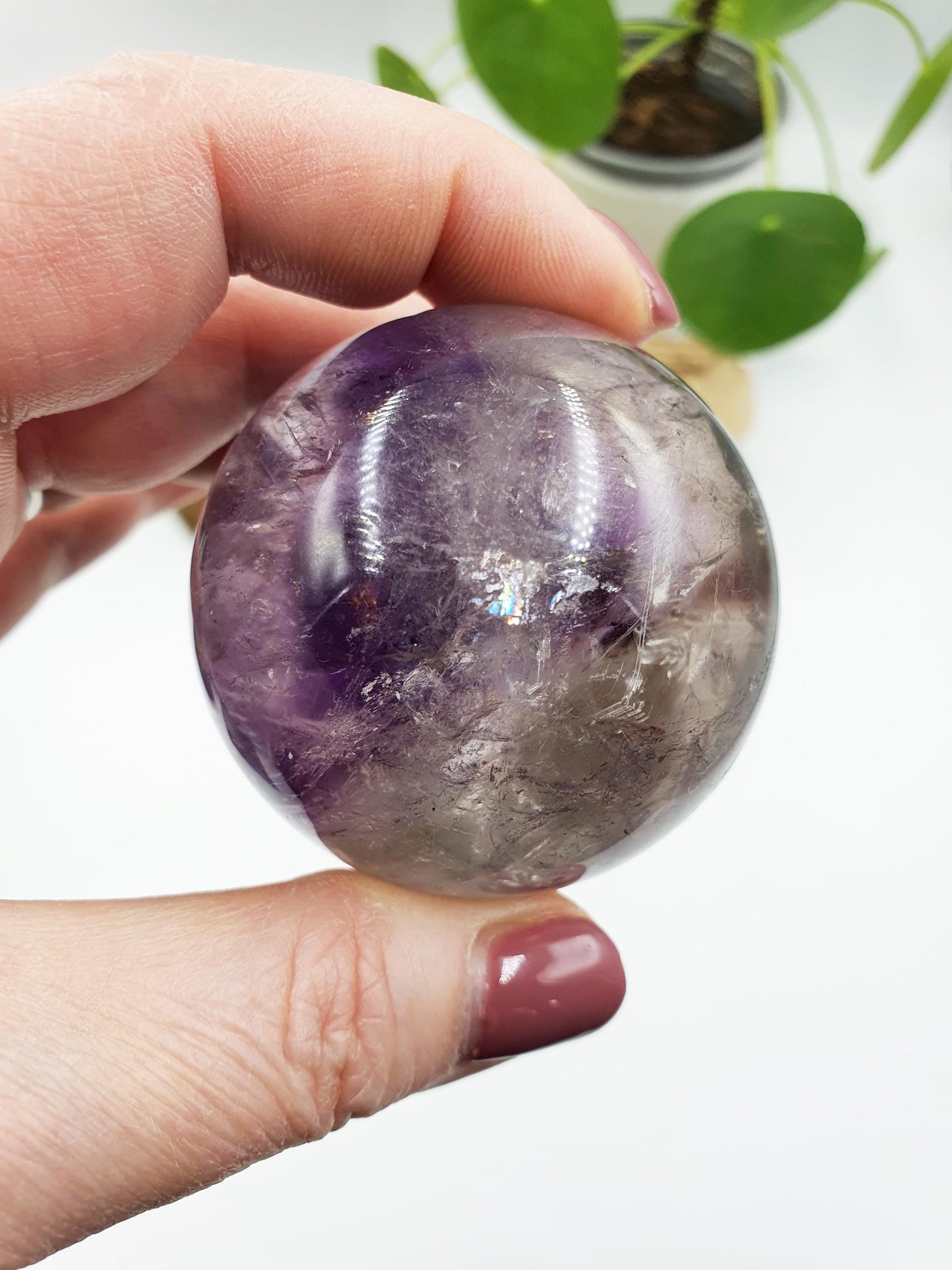 A Grade Phantom Amethyst Sphere with rainbow