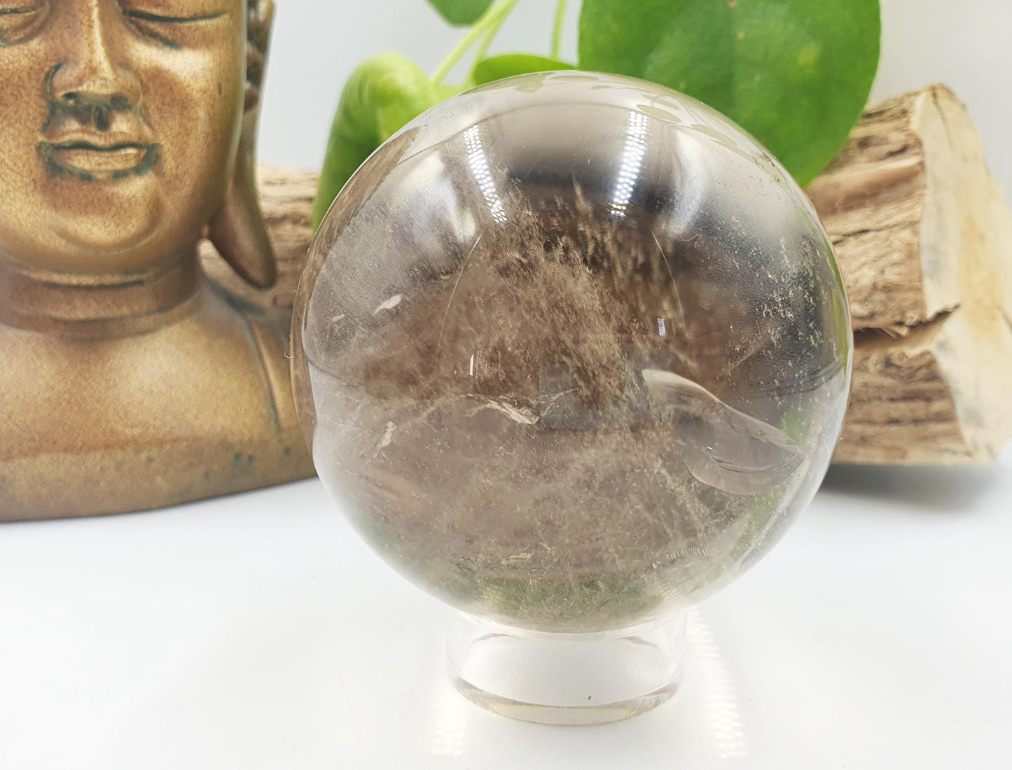 Light Smoky Quartz Sphere with dusting inclusions