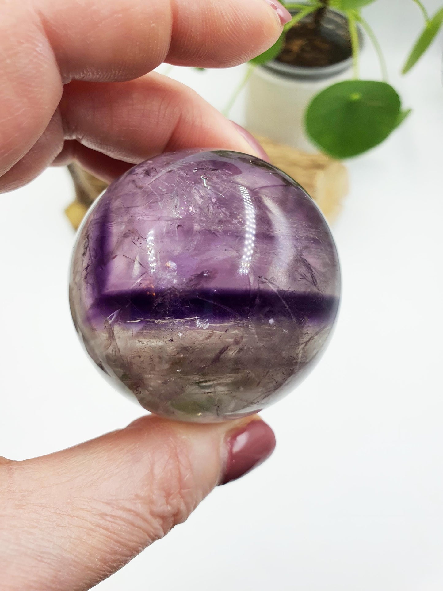 A Grade Phantom Amethyst Sphere with rainbow