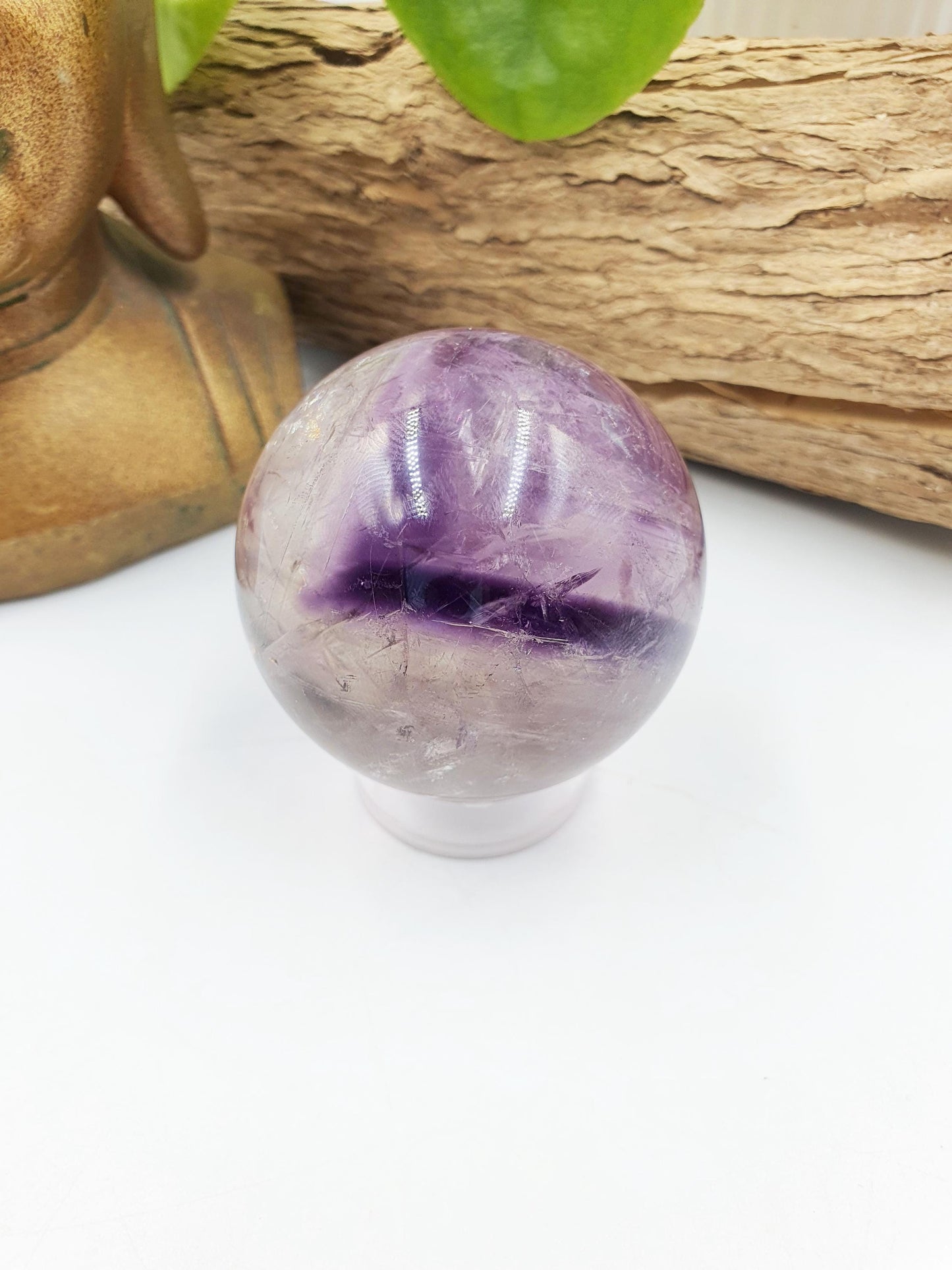 A Grade Phantom Amethyst Sphere with rainbow