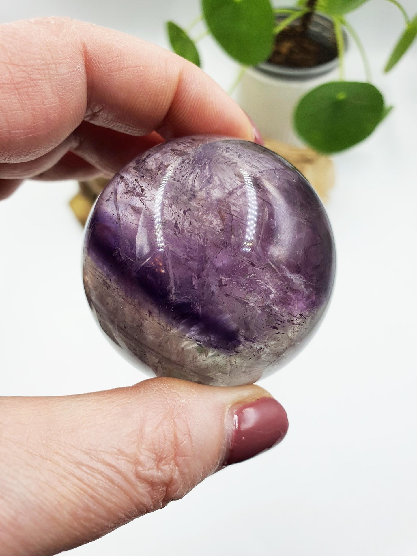 A Grade Phantom Amethyst Sphere with rainbow
