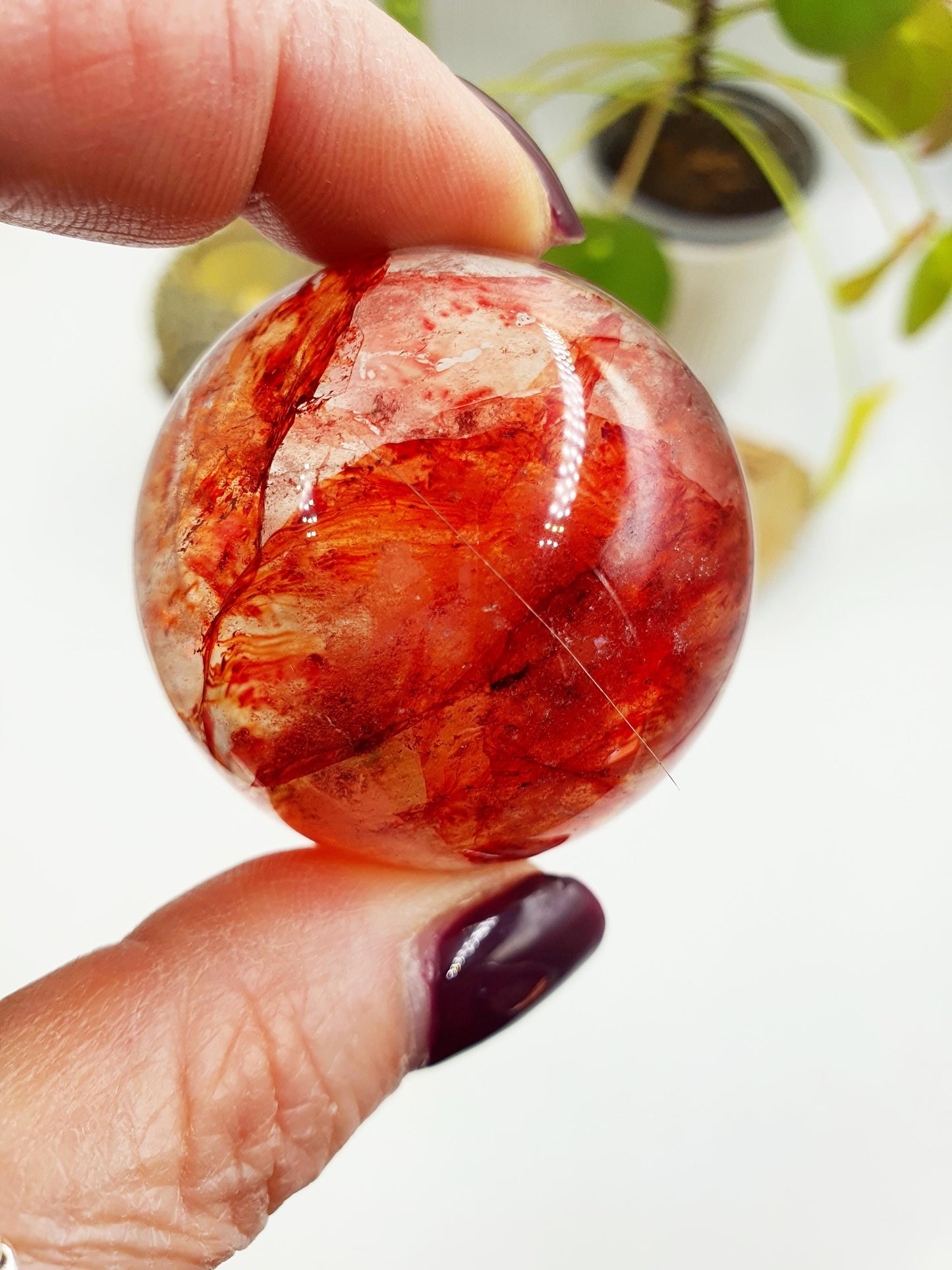 Madagascan Fire Quartz Sphere with Rainbows