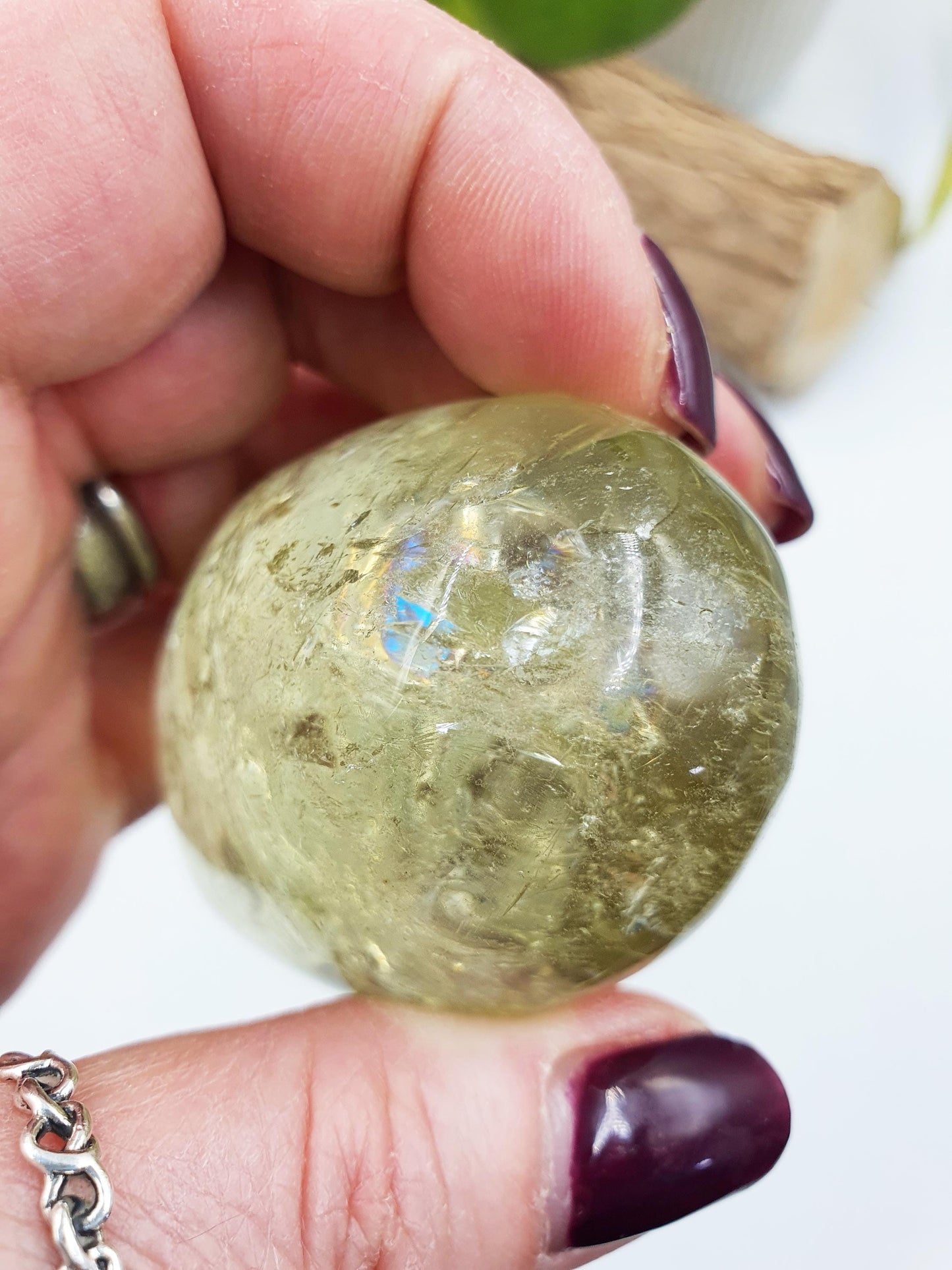 Citrine Palm with shimmering inclusions and rainbows
