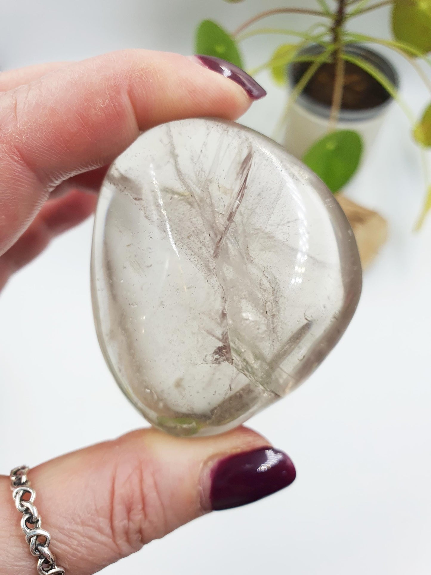 Clear Quartz Palm with shimmering inclusions and rainbows
