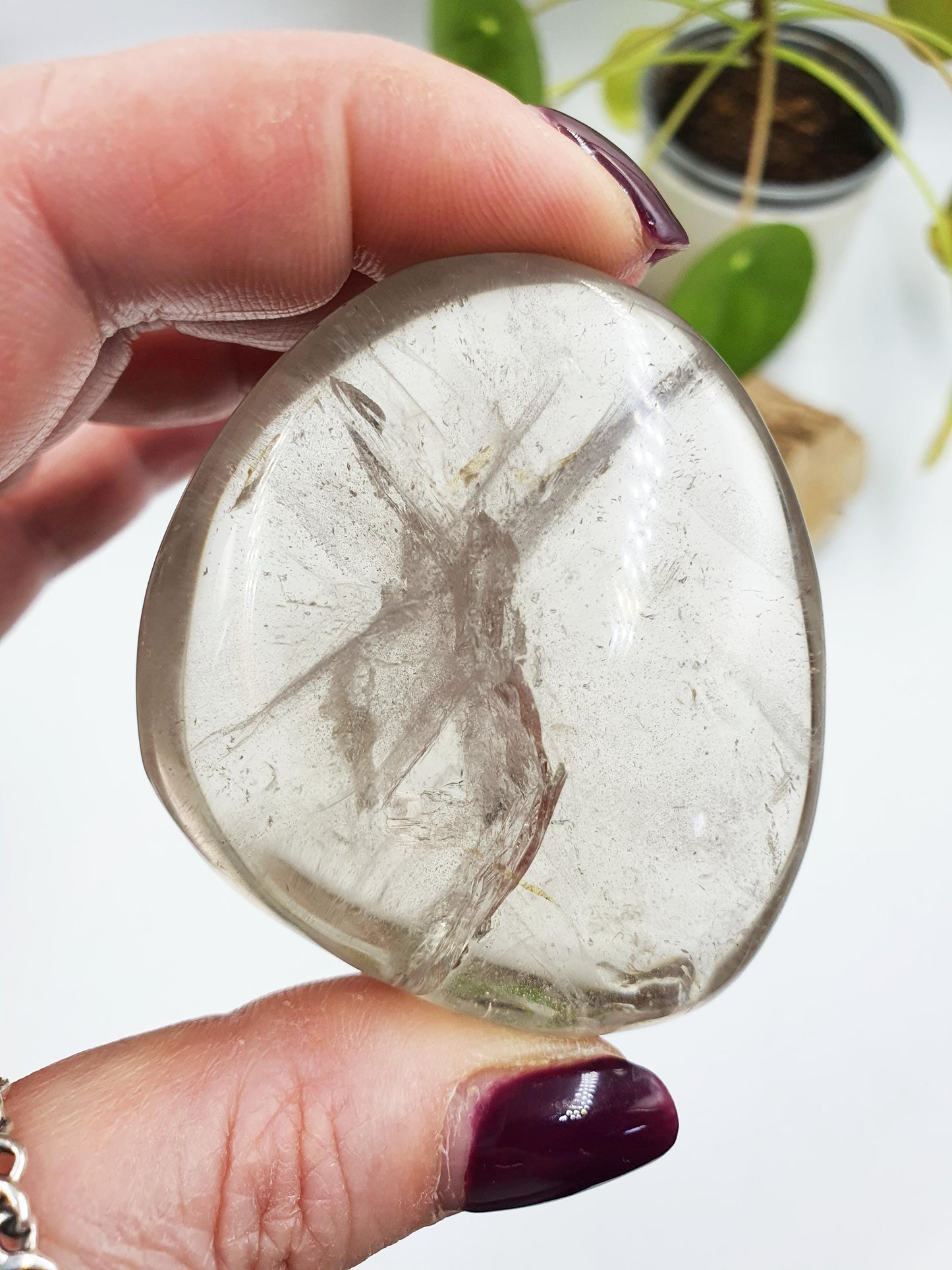 Clear Quartz Palm with shimmering inclusions and rainbows