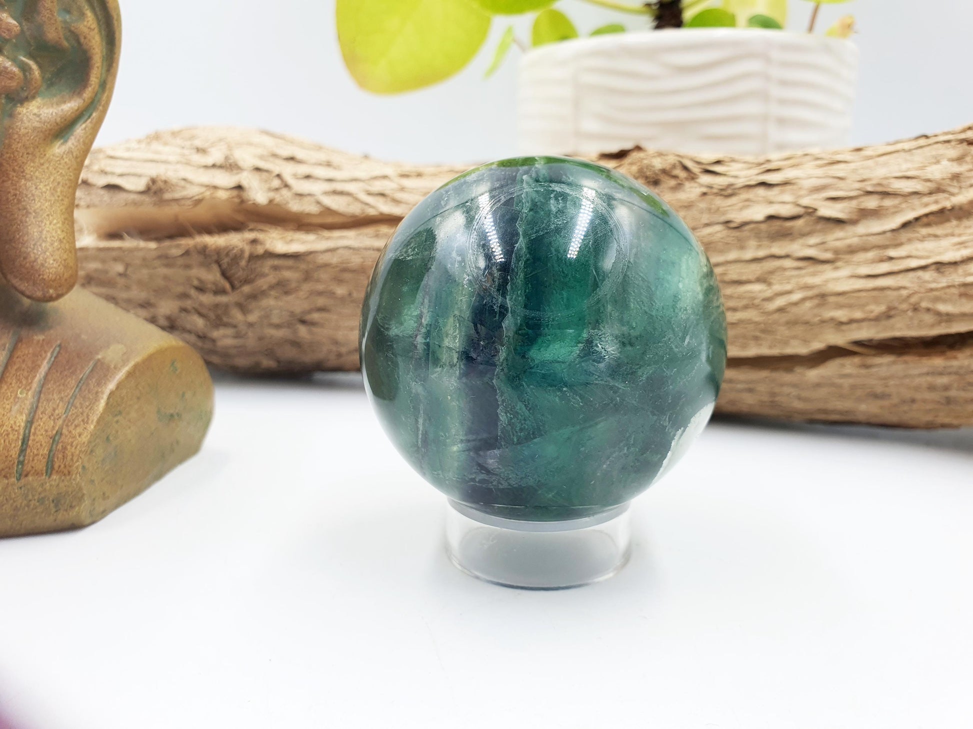 Green Fluorite Sphere with rainbow flashes