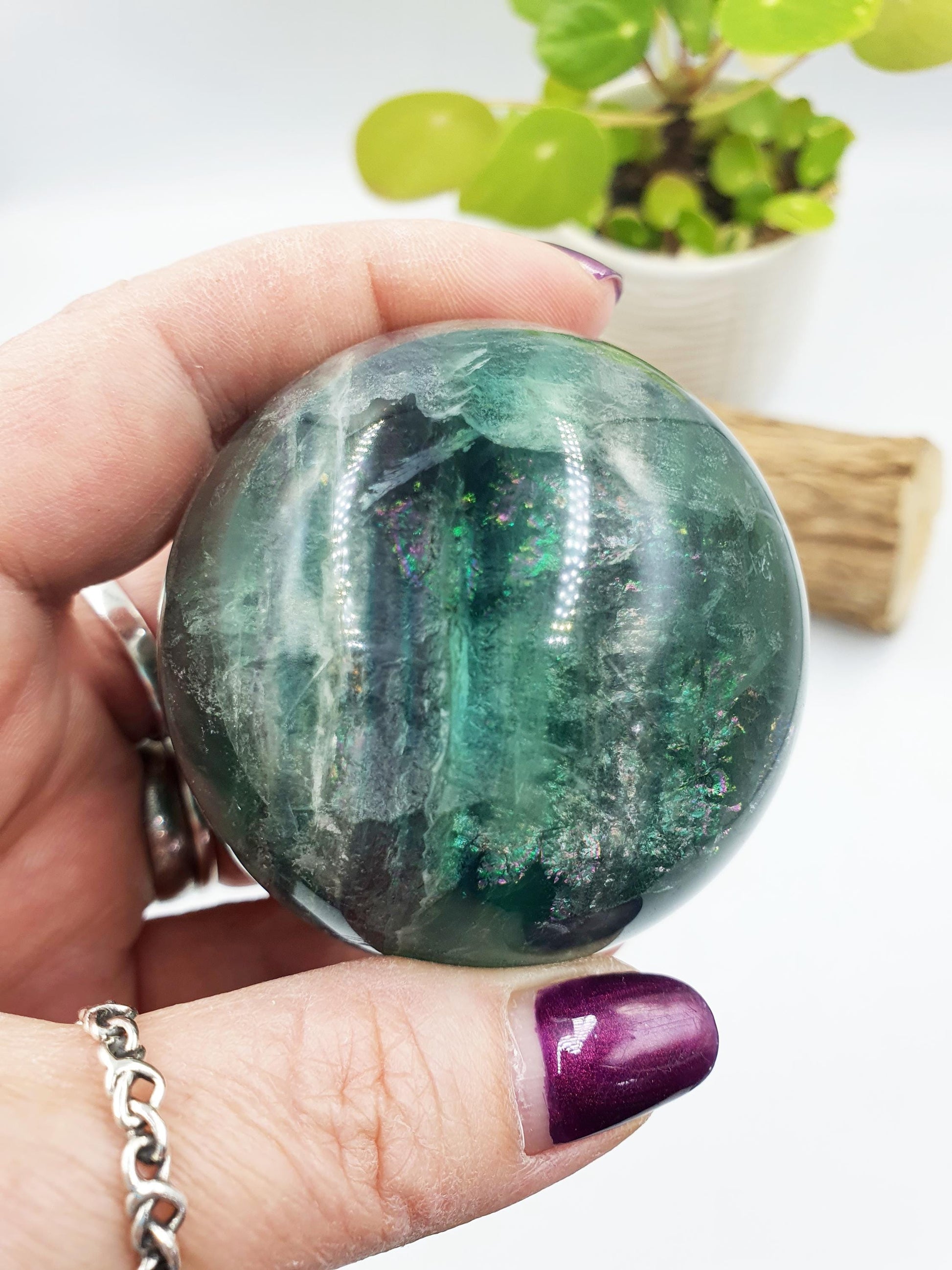 Green Fluorite Sphere with rainbow flashes