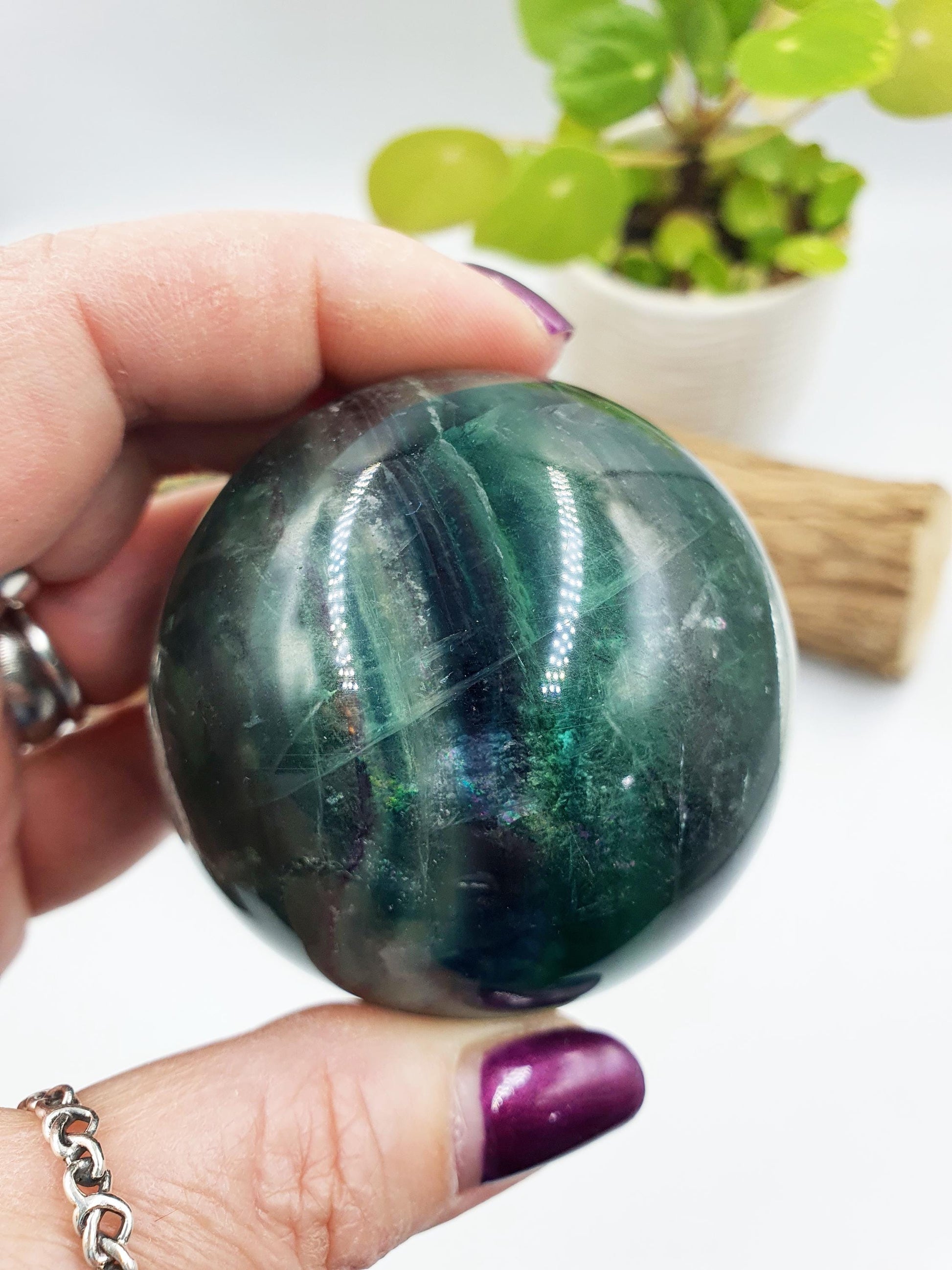 Green Fluorite Sphere with rainbow flashes