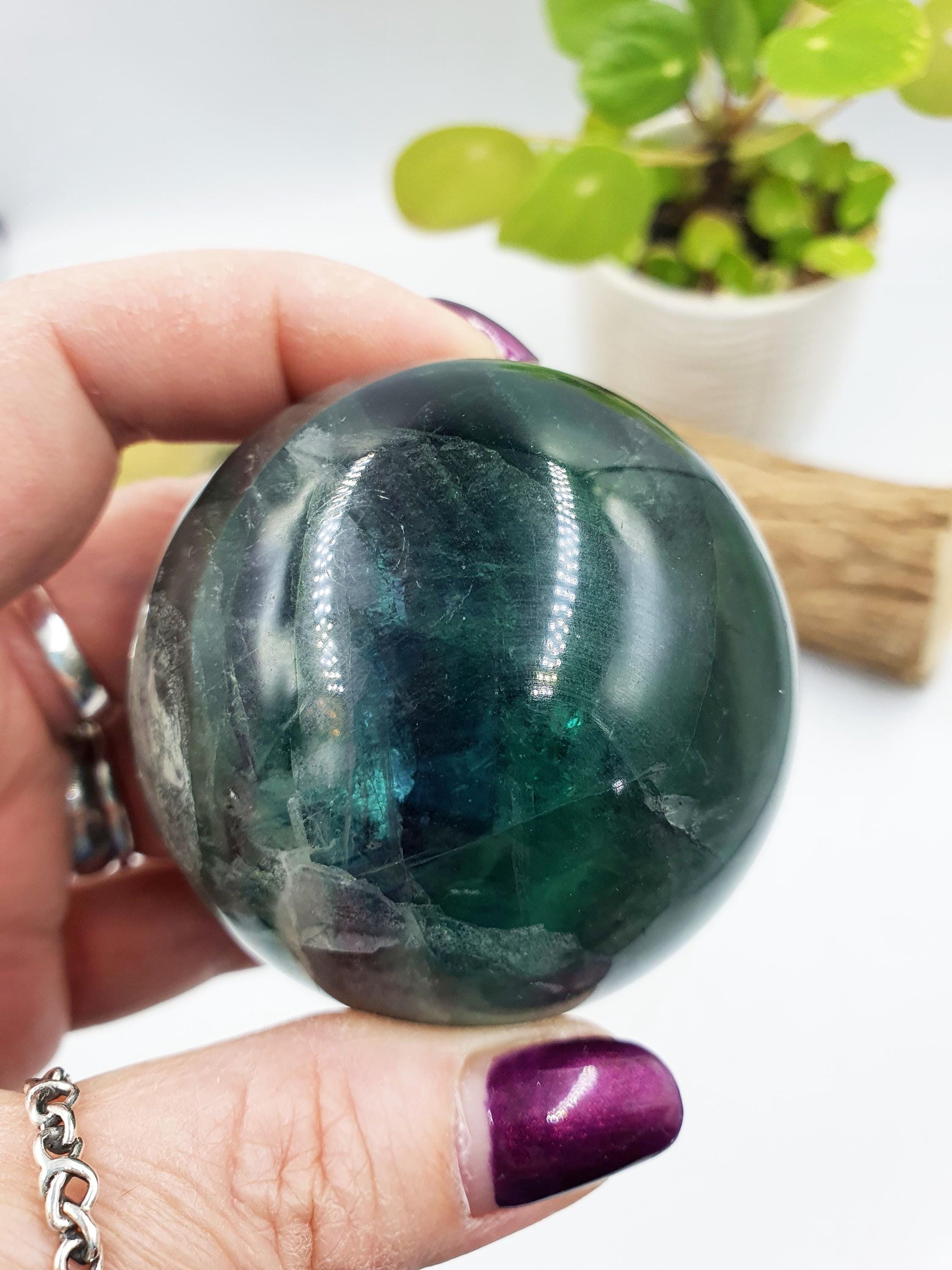 Green Fluorite Sphere with rainbow flashes