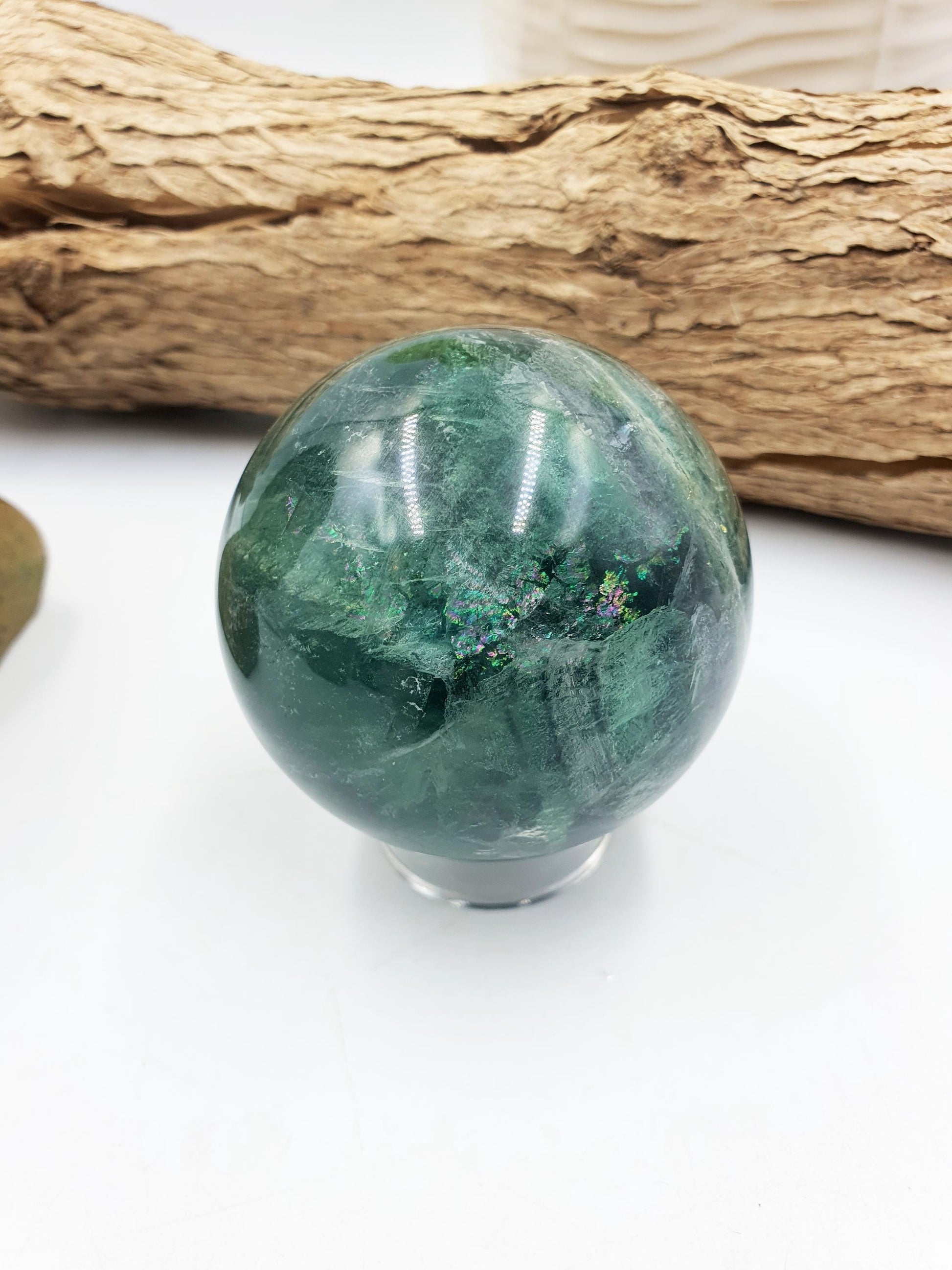 Green Fluorite Sphere with rainbow flashes