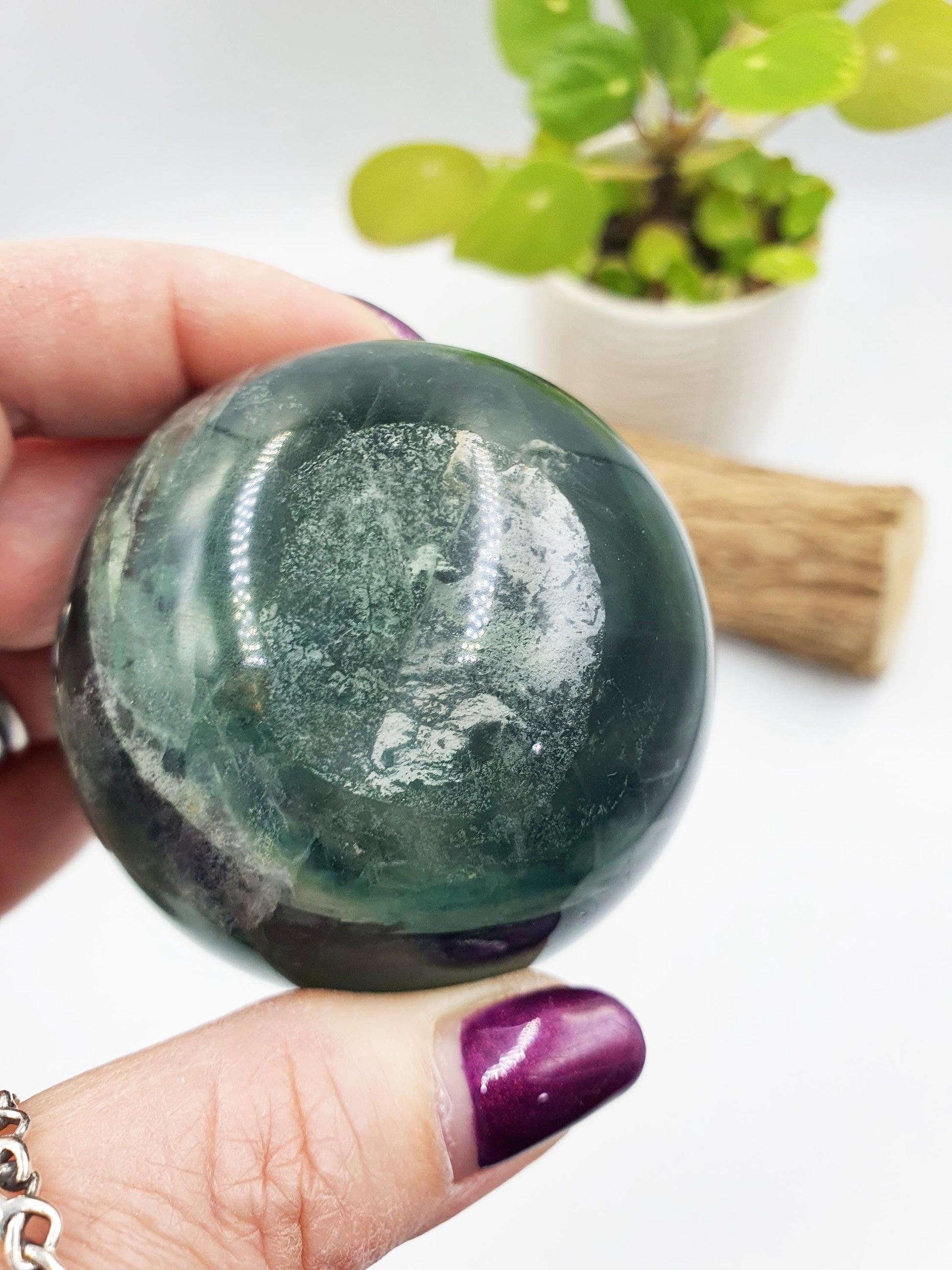 Green Fluorite Sphere with rainbow flashes