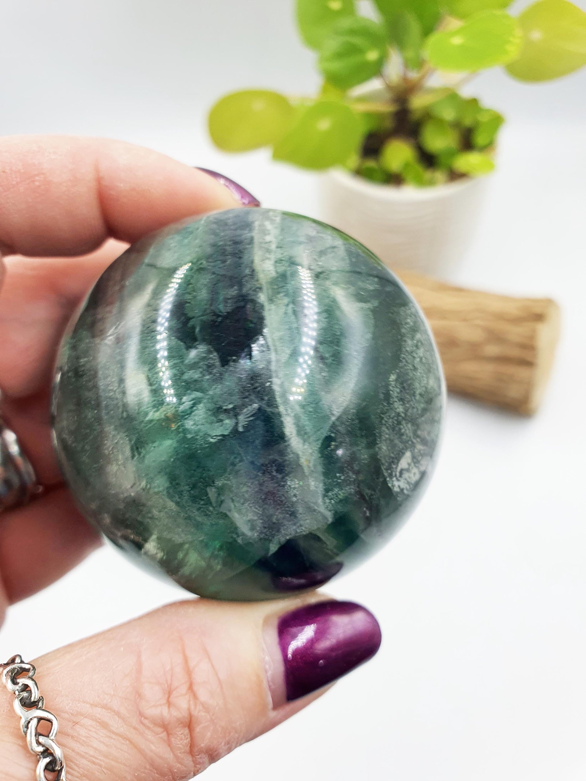 Green Fluorite Sphere with rainbow flashes