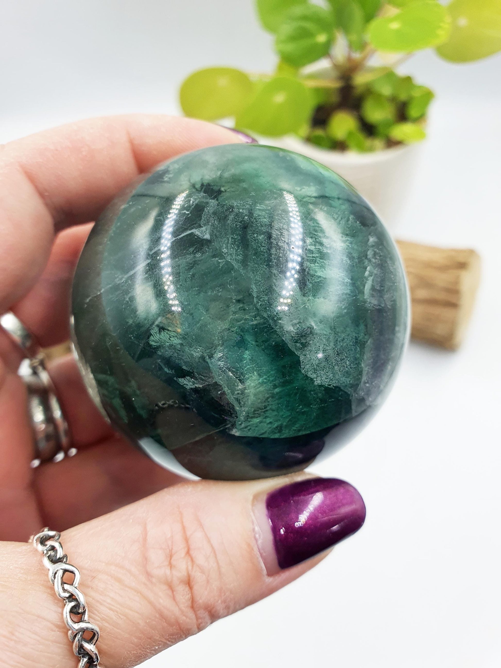 Green Fluorite Sphere with rainbow flashes