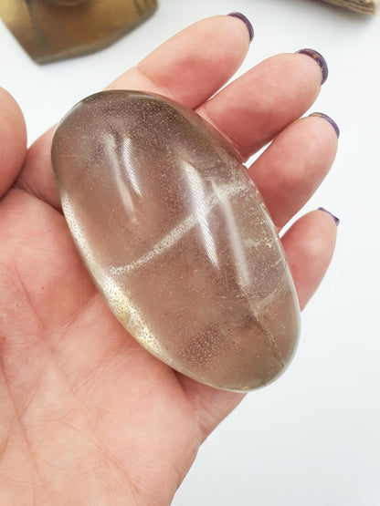 Large Clear Quartz Palm with shimmering inclusions