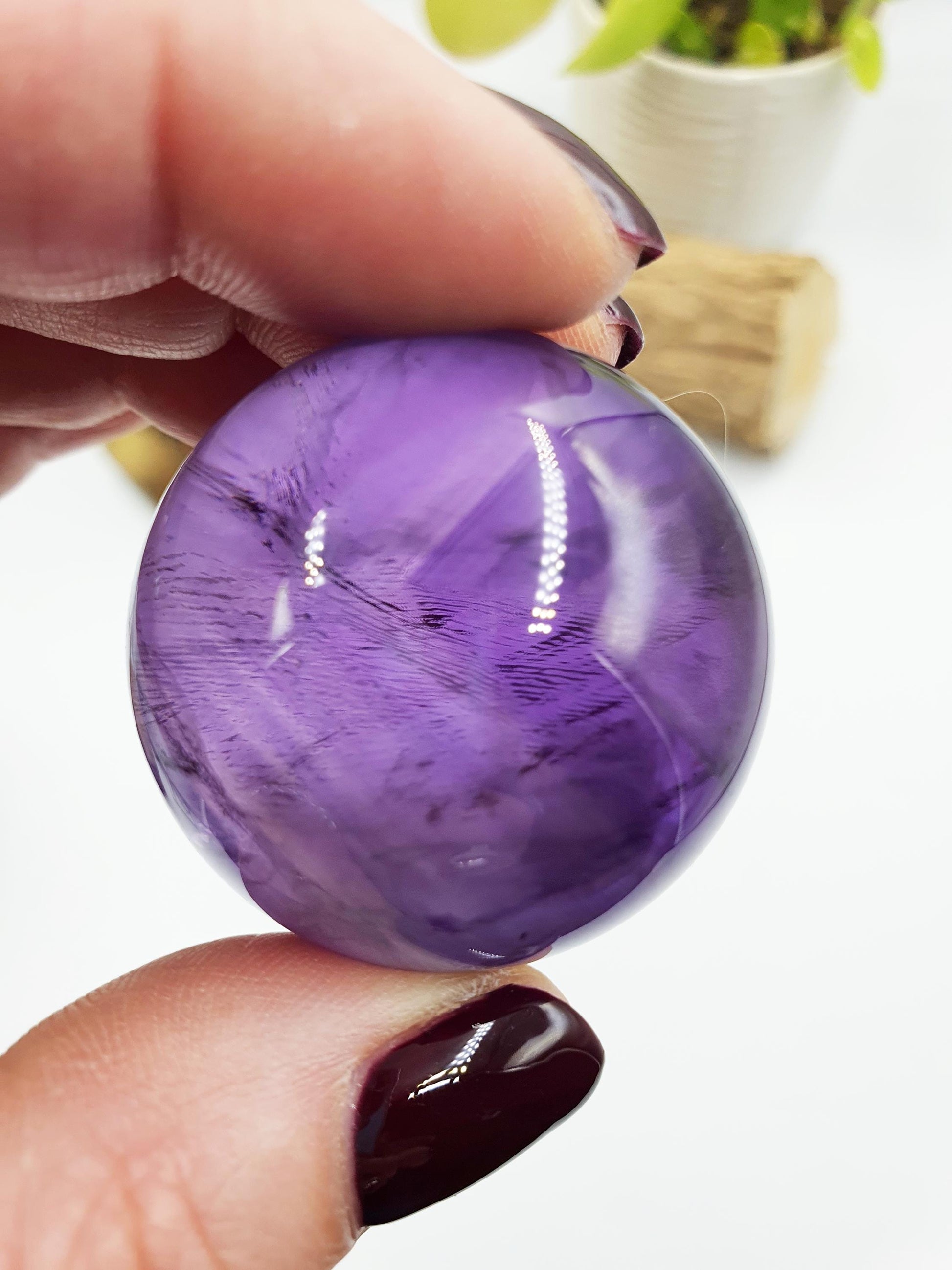 A Grade Amethyst Sphere with finger print inclusions