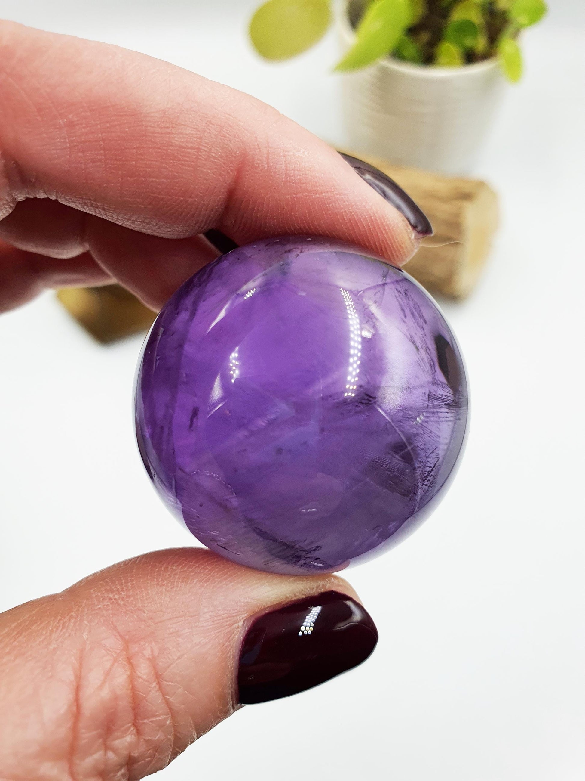 A Grade Amethyst Sphere with finger print inclusions