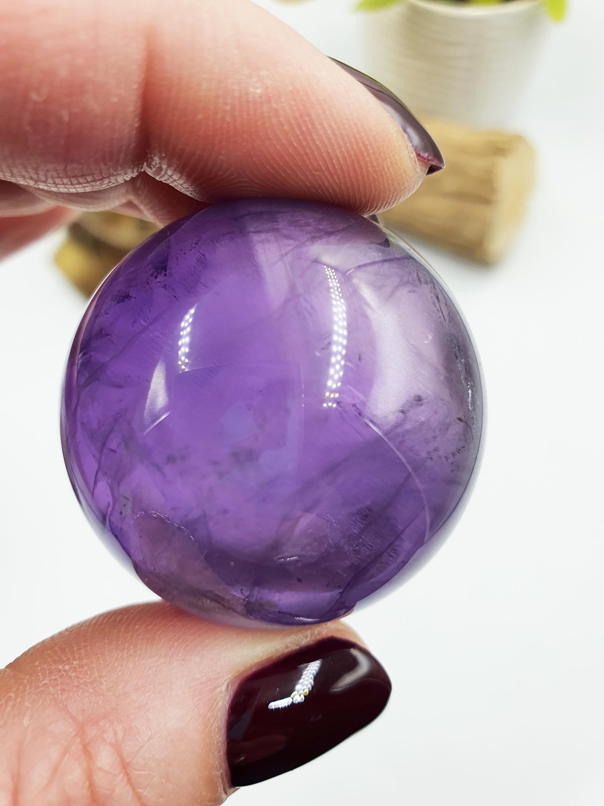 A Grade Amethyst Sphere with finger print inclusions