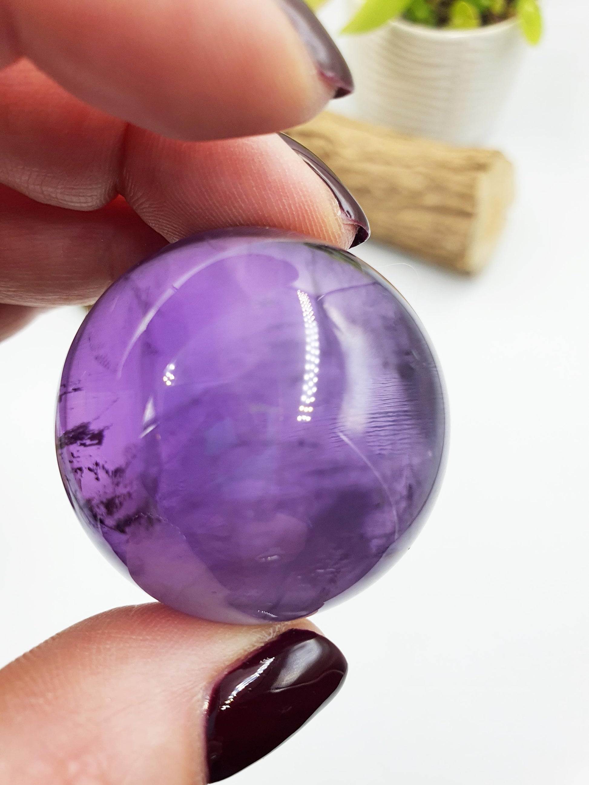 A Grade Amethyst Sphere with finger print inclusions