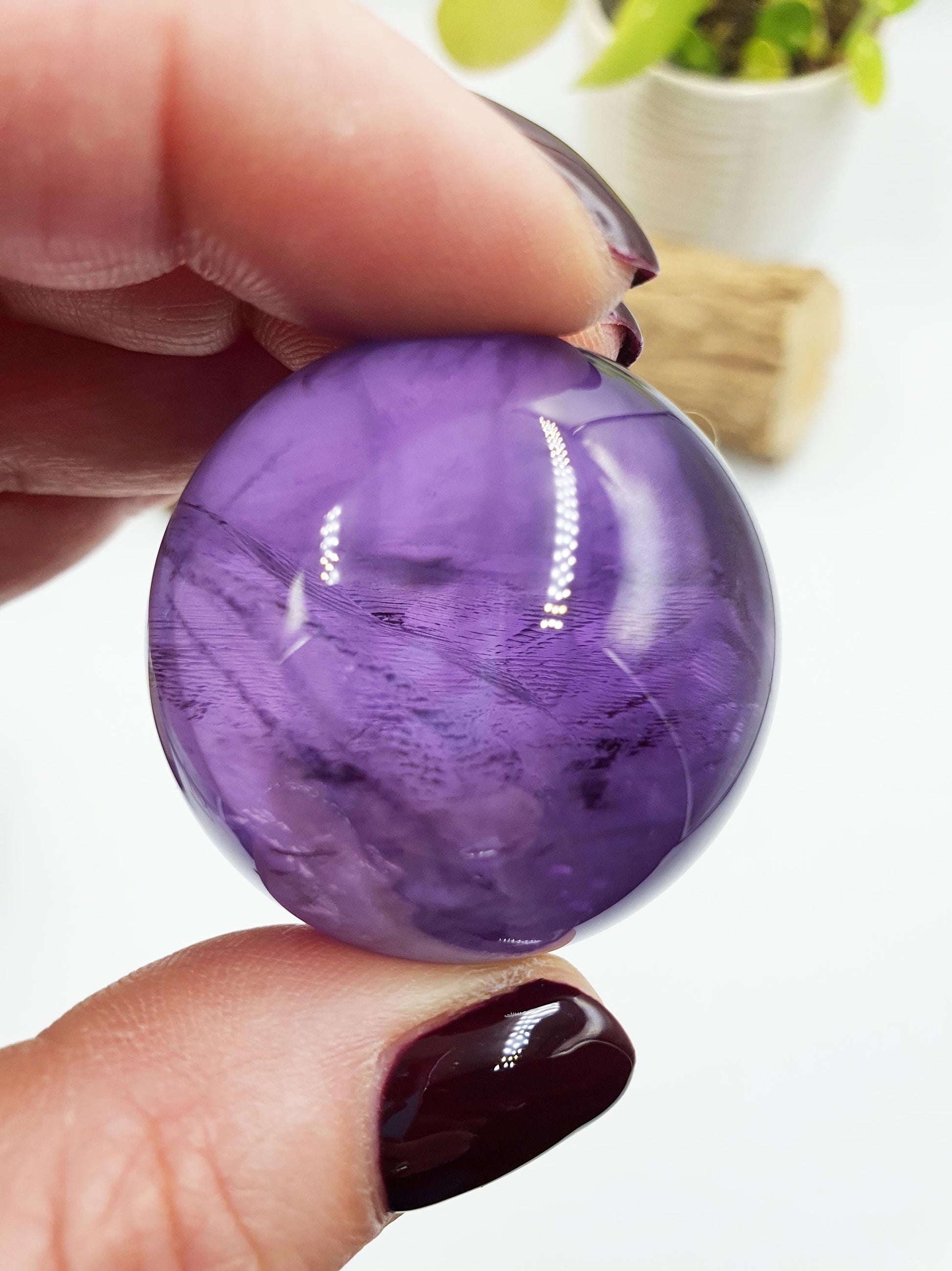 A Grade Amethyst Sphere with finger print inclusions