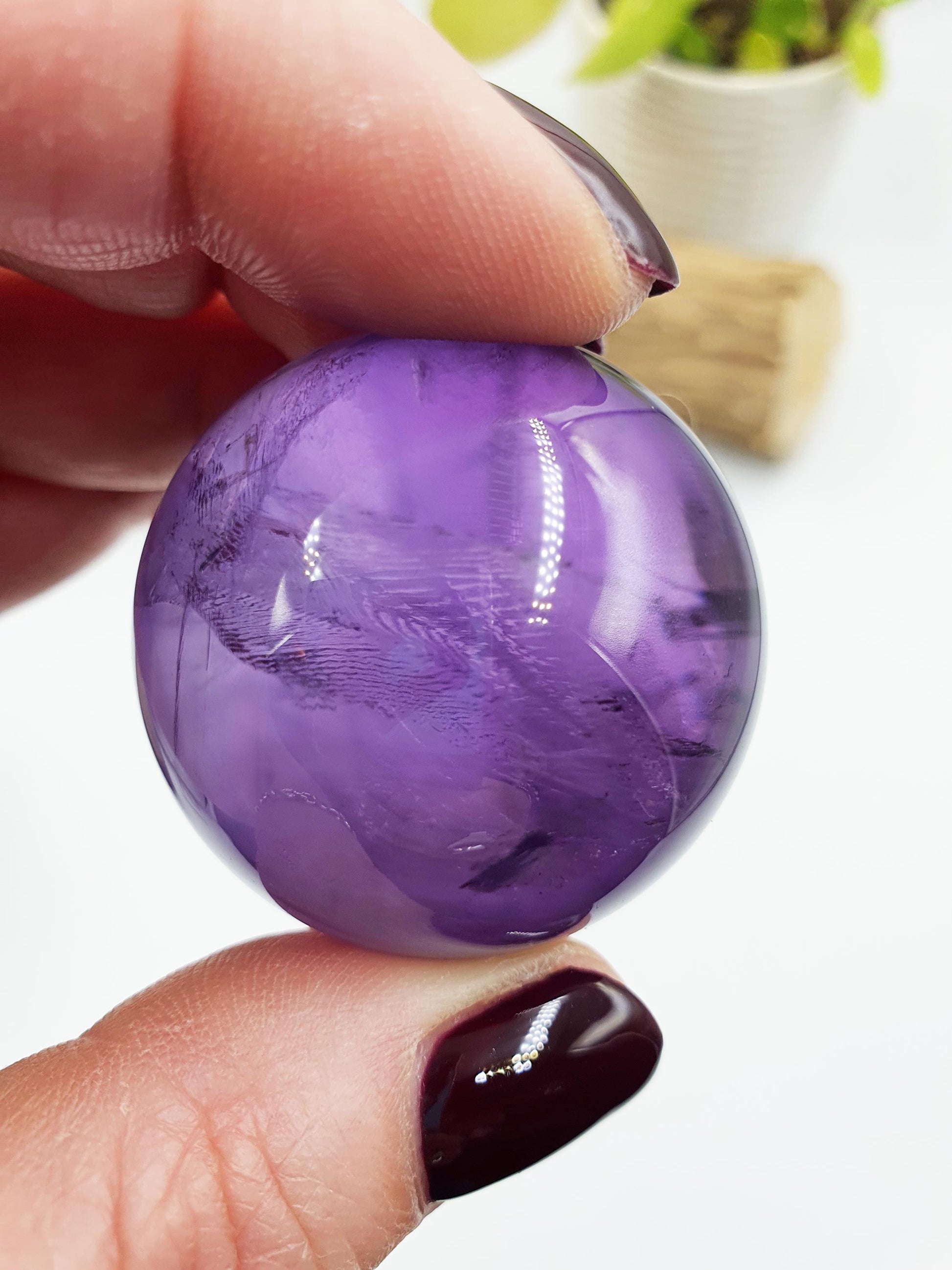 A Grade Amethyst Sphere with finger print inclusions