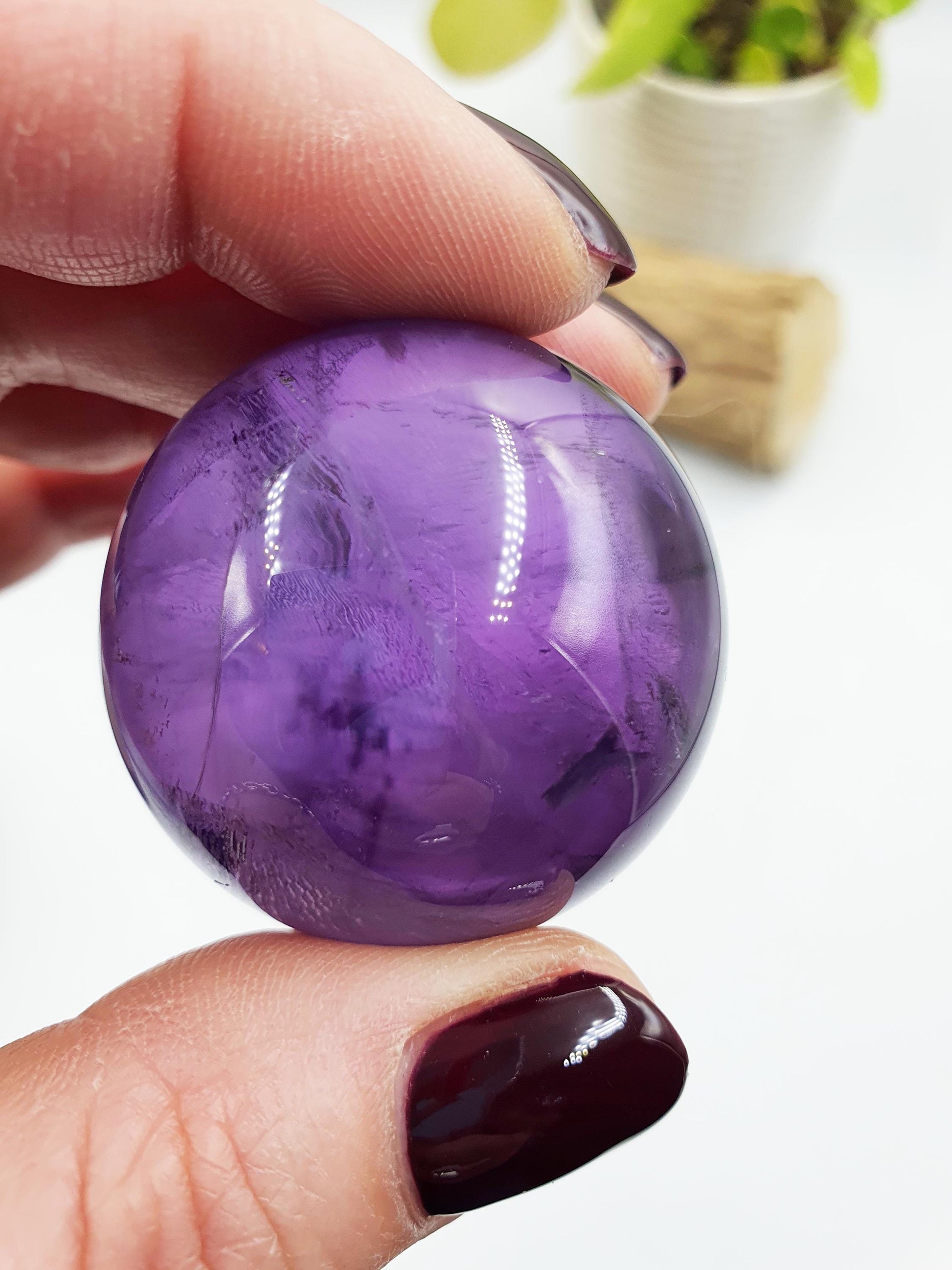 A Grade Amethyst Sphere with finger print inclusions