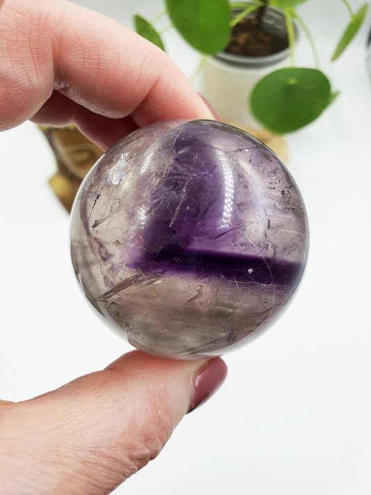 A Grade Phantom Amethyst Sphere with rainbow
