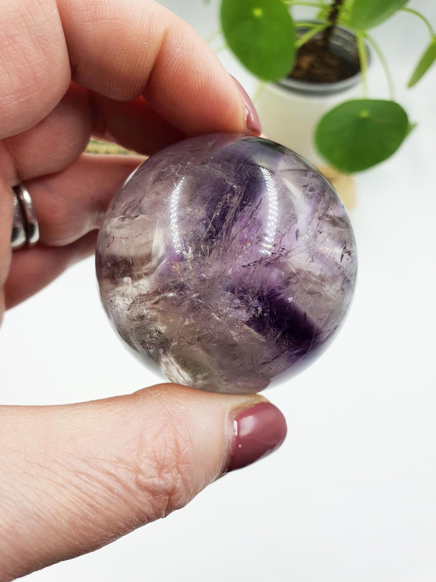 A Grade Phantom Amethyst Sphere with rainbow