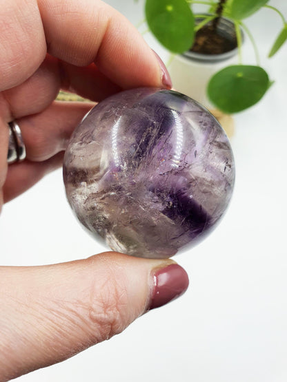 A Grade Phantom Amethyst Sphere with rainbow