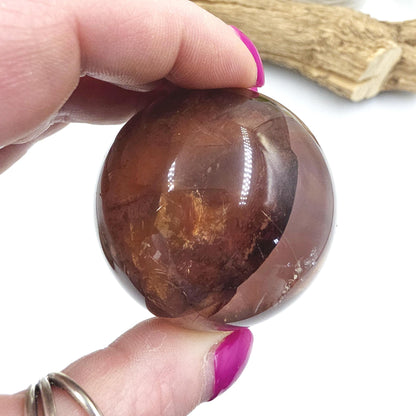 High Grade Fire Quartz Sphere with rainbows – Strength, Confidence & Grounded Energy Crystal, 55mm
