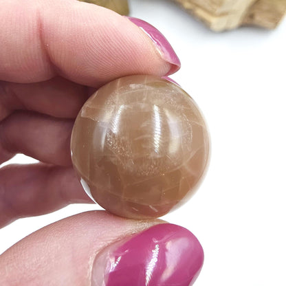 Peach Moonstone Sphere – Intuition, Emotional Balance & Sacral Chakra Crystal, 26mm
