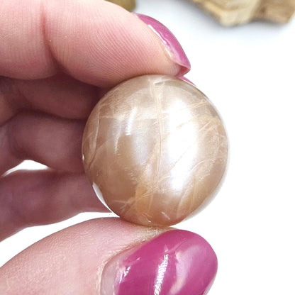 Peach Moonstone Sphere – Intuition, Emotional Balance & Sacral Chakra Crystal, 26mm