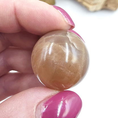 Peach Moonstone Sphere – Intuition, Emotional Balance & Sacral Chakra Crystal, 26mm