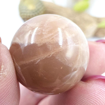 Peach Moonstone Sphere – Intuition, Emotional Balance & Sacral Chakra Crystal, 26mm