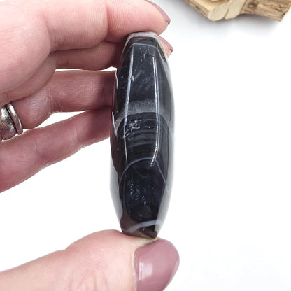 Banded Black Agate Palm Stone – Protection, Stability & Grounding Support Crystal, 80g