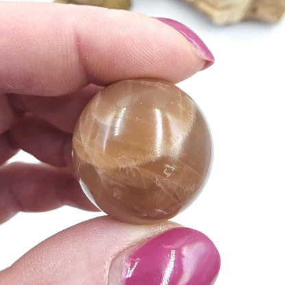 Peach Moonstone Sphere – Intuition, Emotional Balance & Sacral Chakra Crystal, 26mm